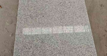 儋州芝麻白光面毛板