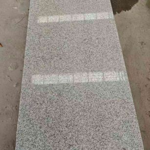 儋州芝麻白光面毛板