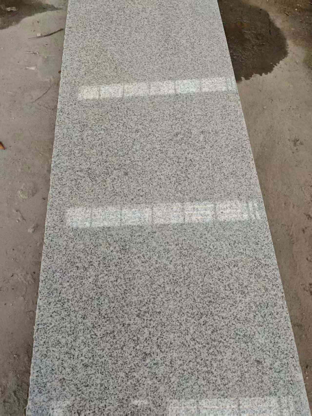 儋州芝麻白光面毛板